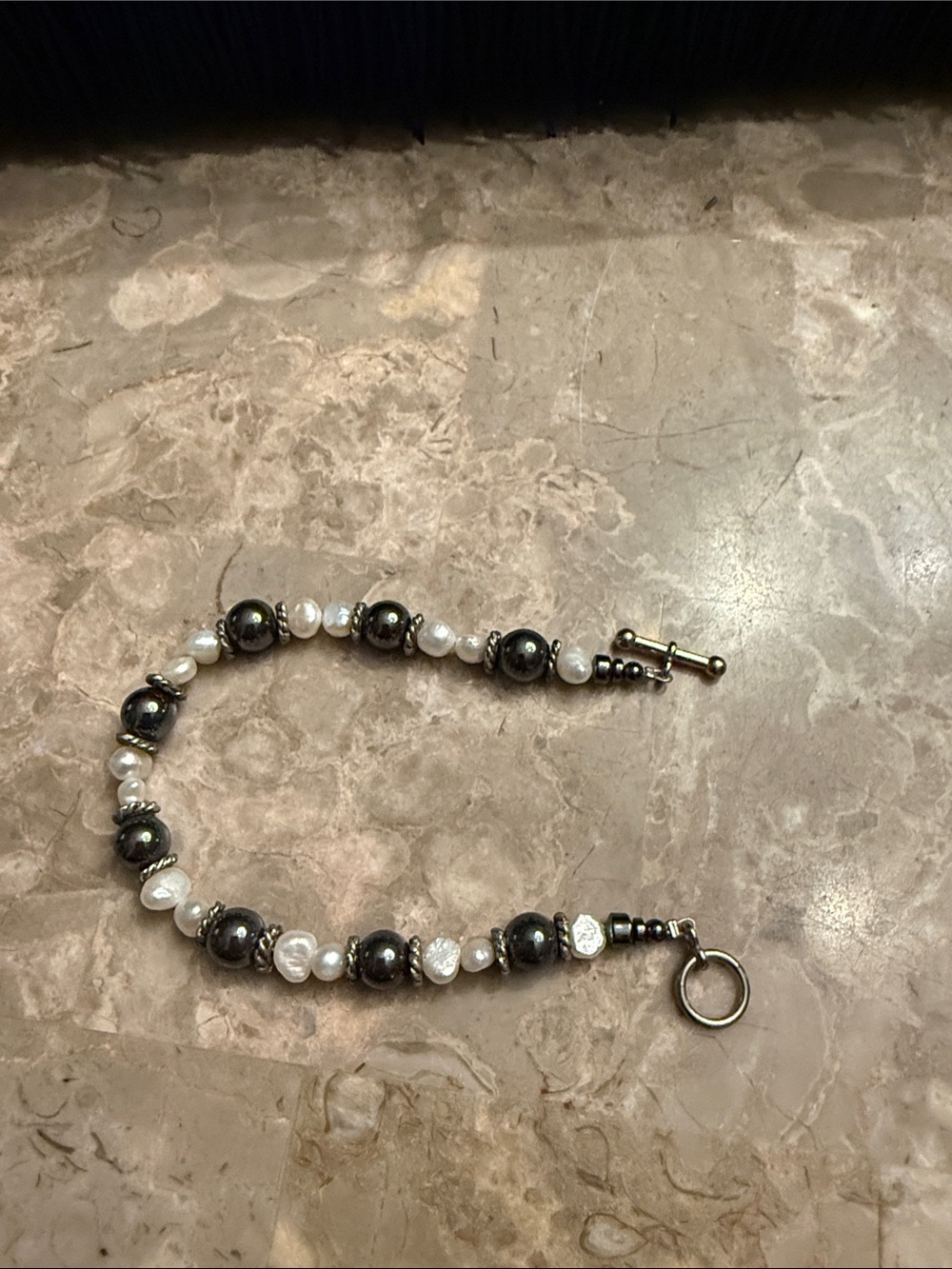 Artisan created genuine, pearl, and genuine, hematite beaded toggle bracelet